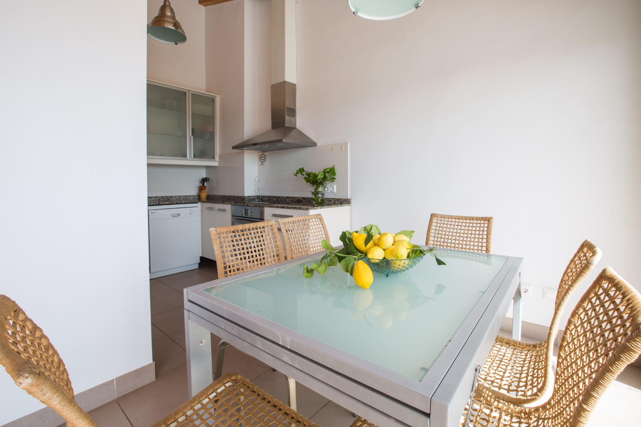 Outdoor terrace and garden at Es Port (Portopetro) in Spain